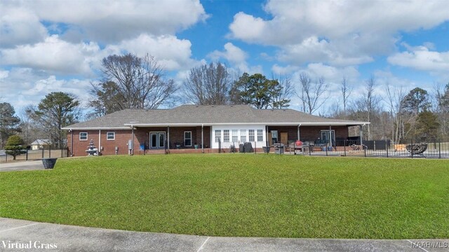 9524 County Road 42nd Rd, Jemison, AL 35085 - back of property featuring a lawn, a patio area, fence, and brick siding