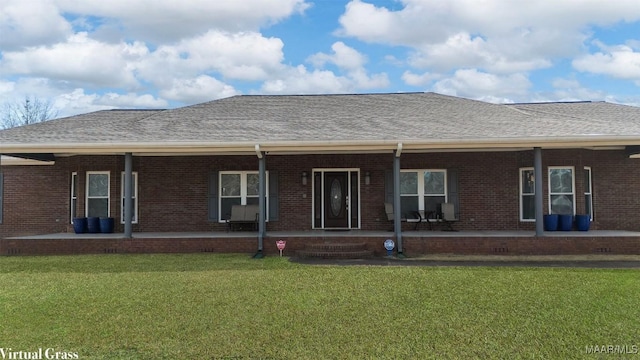 9524 County Road 42nd Rd, Jemison, AL 35085 - back of house featuring roof with shingles, a yard, a porch, and brick siding