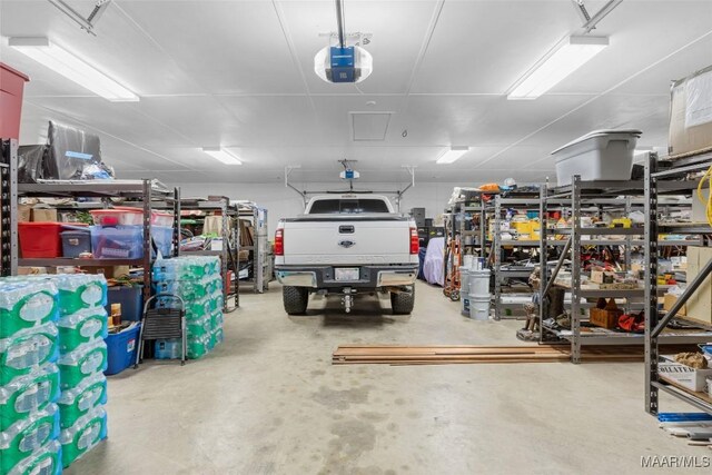 9524 County Road 42nd Rd, Jemison, AL 35085 - garage featuring a garage door opener