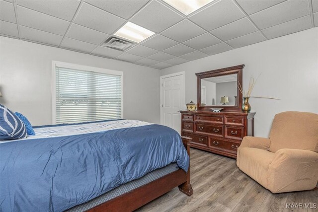9524 County Road 42nd Rd, Jemison, AL 35085 - bedroom with a drop ceiling, wood finished floors, and visible vents
