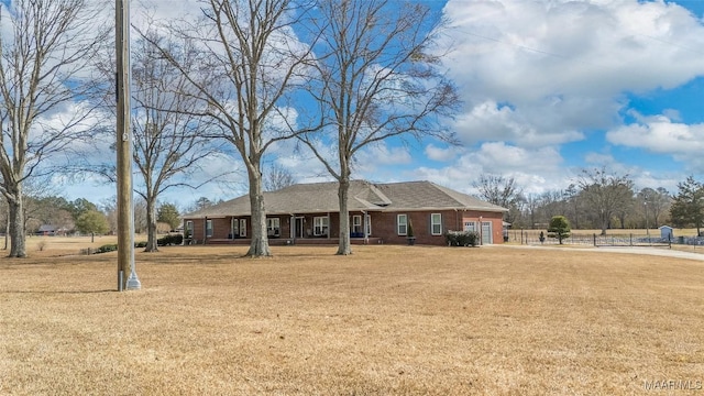 9524 County Road 42nd Rd, Jemison, AL 35085 - single story home featuring brick siding, a front lawn, roof with shingles, and a garage