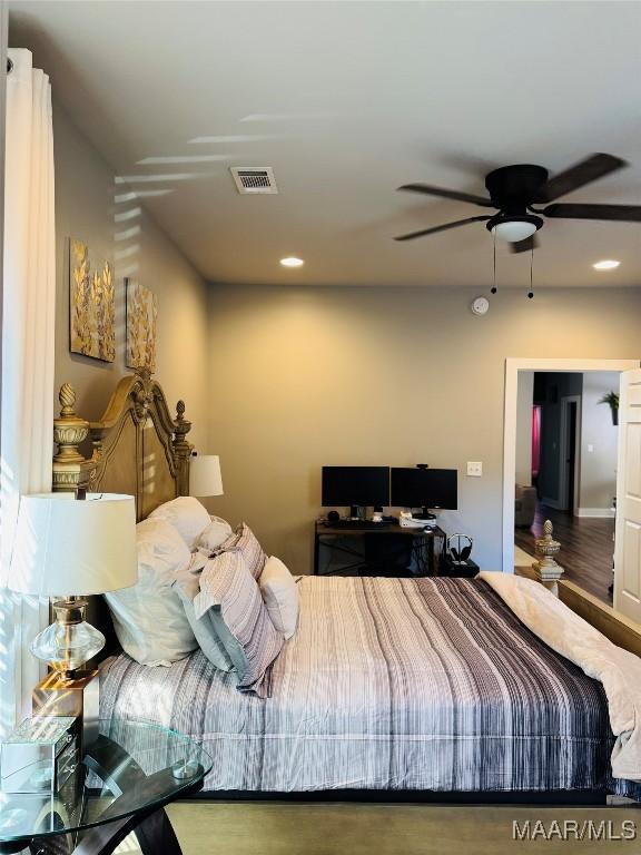 bedroom featuring visible vents, wood finished floors, a ceiling fan, and recessed lighting