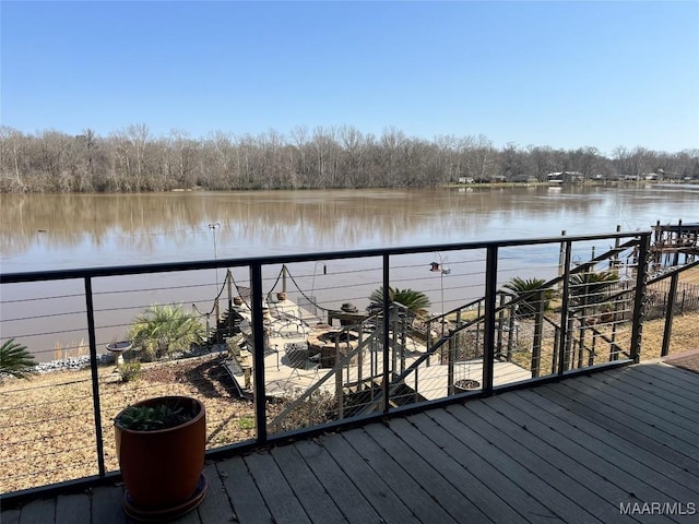 deck featuring a water view