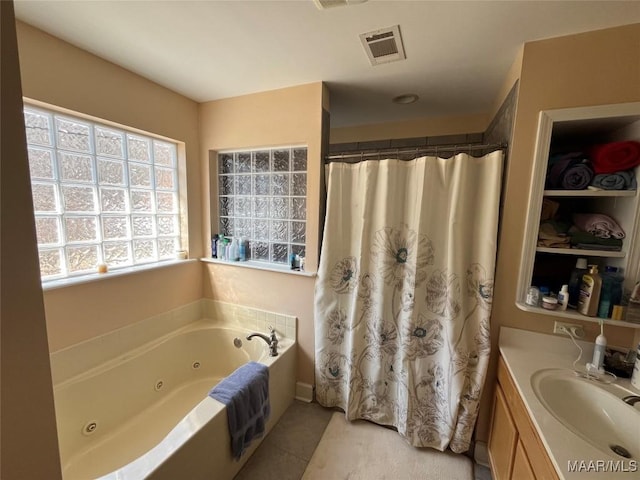 full bath featuring visible vents, a shower with shower curtain, a jetted tub, tile patterned flooring, and vanity