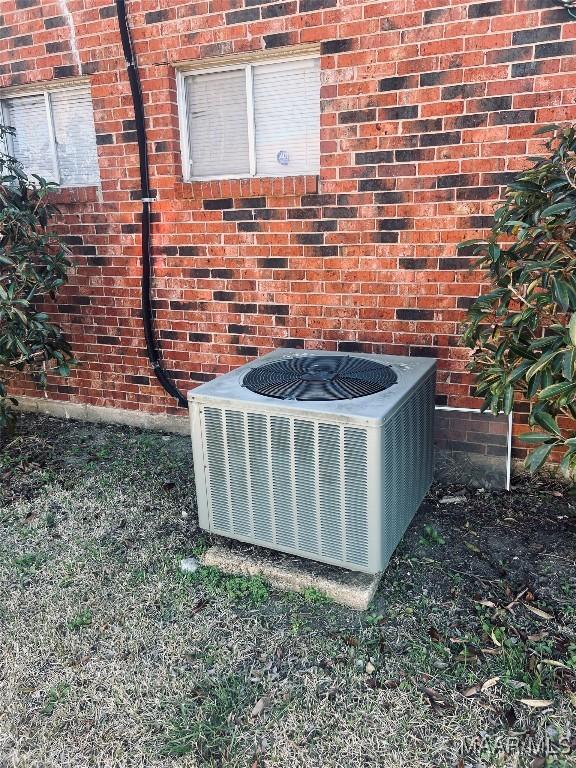 details with brick siding and cooling unit