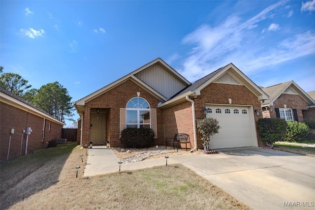 ranch-style house with a garage, concrete driveway, brick siding, and central AC unit