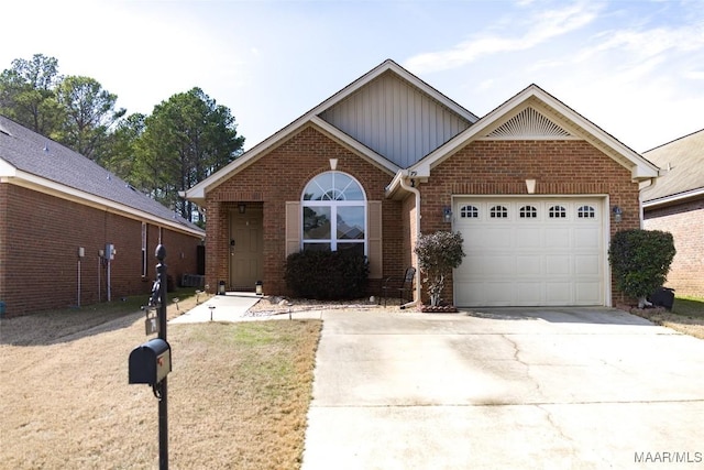 view of front facade featuring a garage, concrete driveway, brick siding, and board and batten siding