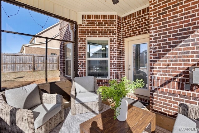 view of patio / terrace featuring fence and an outdoor living space