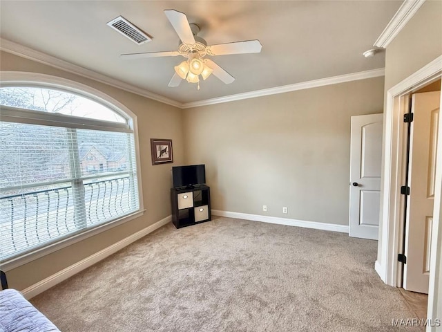 interior space with light carpet, baseboards, visible vents, and crown molding