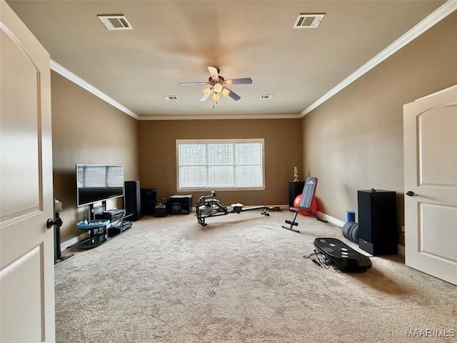 exercise area with carpet floors, baseboards, visible vents, and ornamental molding