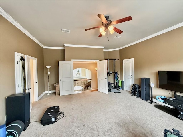 interior space with carpet floors, baseboards, visible vents, and ornamental molding