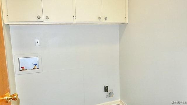 washroom featuring baseboards, washer hookup, cabinet space, and electric dryer hookup