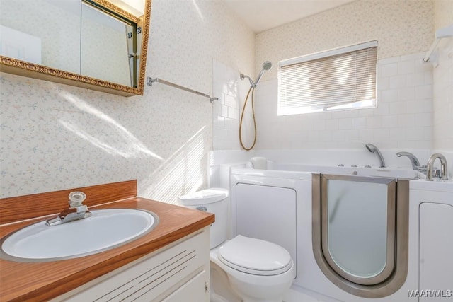 full bathroom featuring toilet, walk in shower, a tub, and wallpapered walls