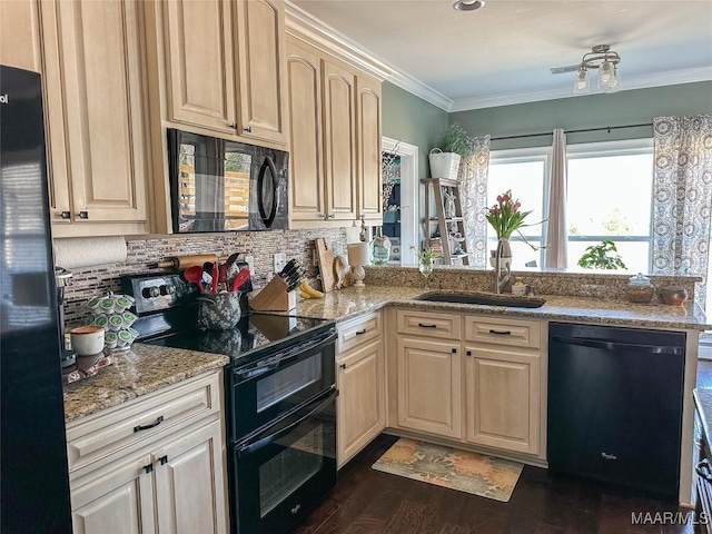 kitchen with backsplash, ornamental molding, a sink, a peninsula, and black appliances