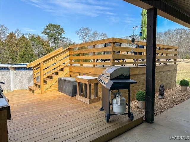 wooden deck with grilling area