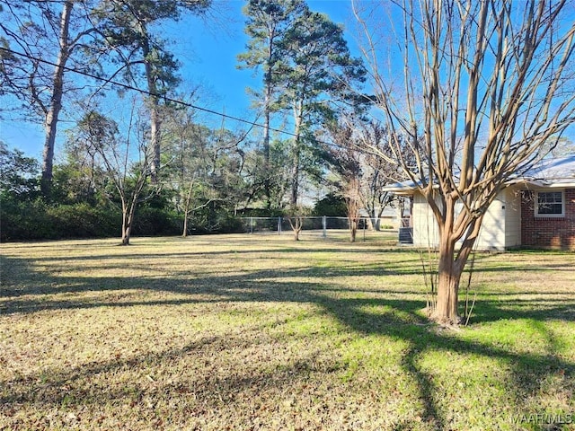 view of yard with fence