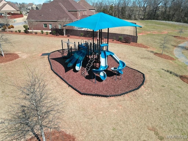 community play area with a lawn