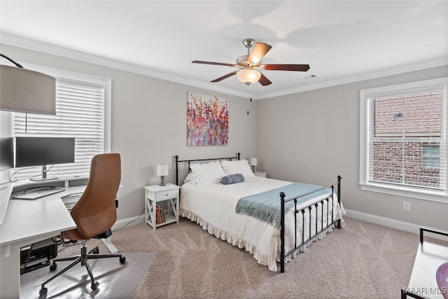 bedroom featuring visible vents, baseboards, ceiling fan, crown molding, and carpet floors