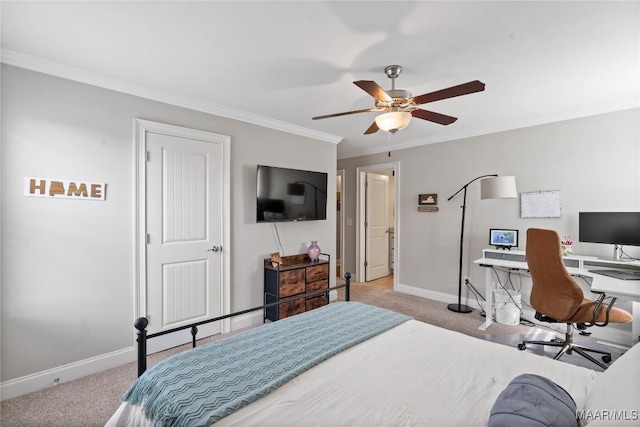 bedroom featuring ornamental molding, carpet flooring, a ceiling fan, and baseboards