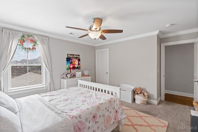 bedroom featuring carpet, crown molding, visible vents, ceiling fan, and baseboards