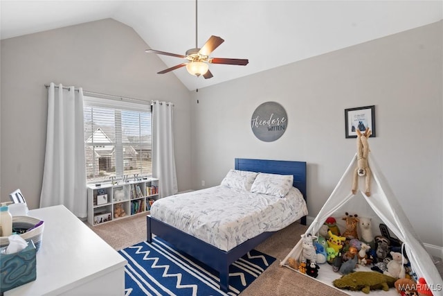 carpeted bedroom featuring vaulted ceiling and ceiling fan