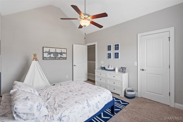 carpeted bedroom featuring lofted ceiling and ceiling fan