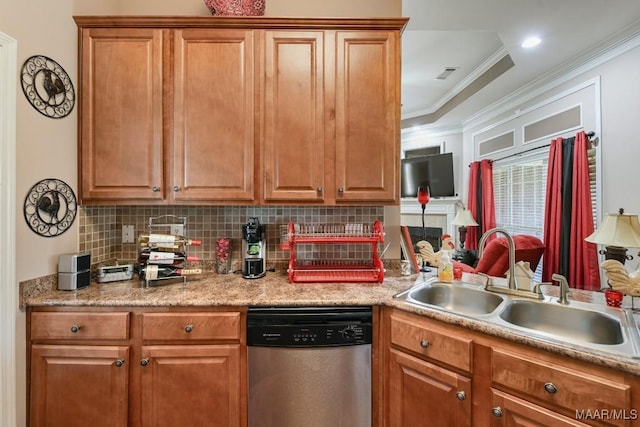 kitchen featuring visible vents, backsplash, stainless steel dishwasher, ornamental molding, and a sink