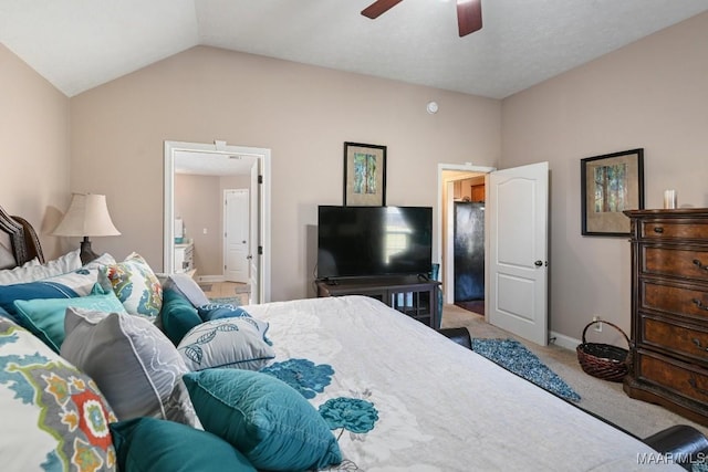 bedroom featuring vaulted ceiling, carpet floors, a ceiling fan, and baseboards