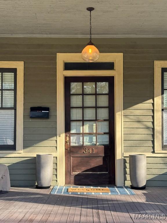 property entrance with a porch