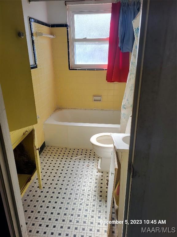 full bath with vanity and toilet