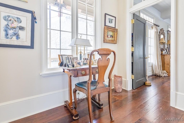 office area featuring dark wood finished floors and baseboards