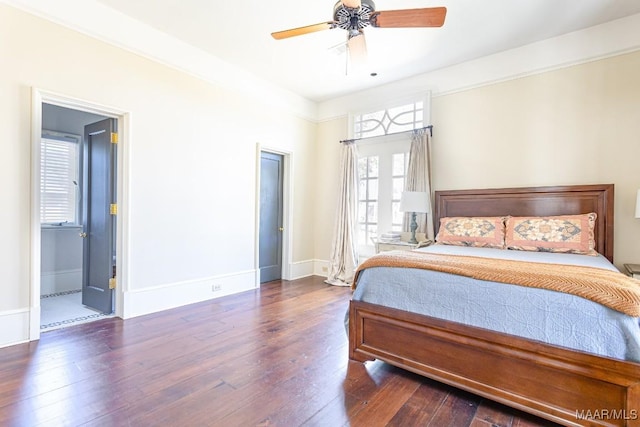 bedroom featuring hardwood / wood-style flooring, baseboards, and a ceiling fan