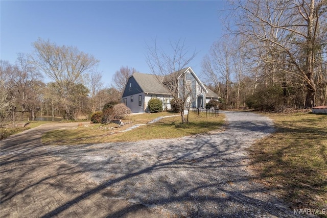 view of home's exterior with driveway