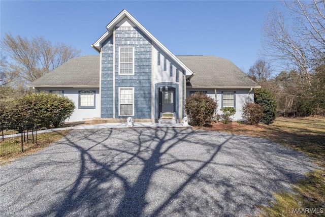 view of front of house featuring a shingled roof