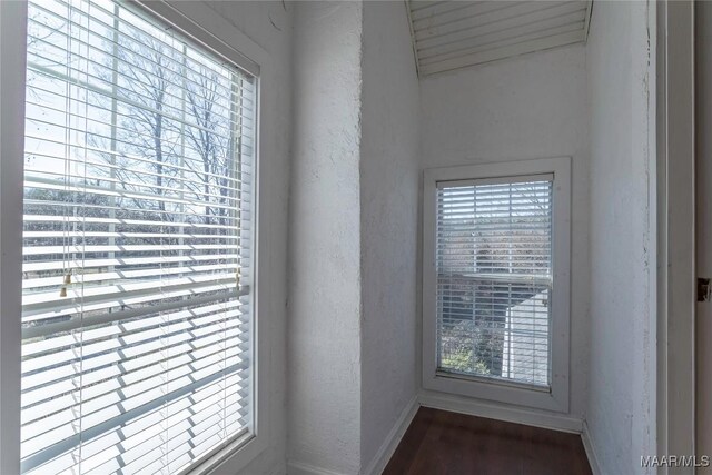 room details with a textured wall and baseboards