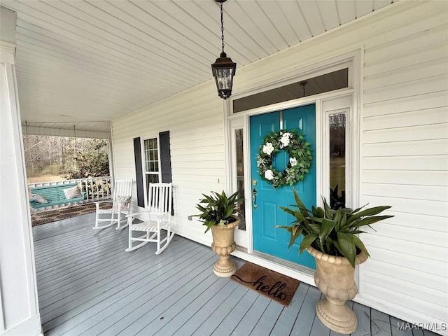 entrance to property with covered porch