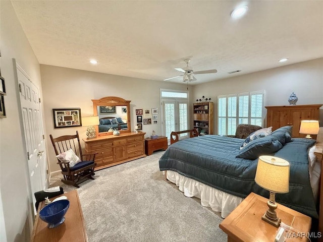 bedroom with carpet, visible vents, a ceiling fan, and recessed lighting