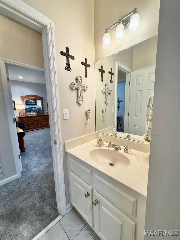 bathroom with vanity and tile patterned floors