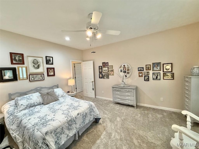 bedroom with carpet flooring, ceiling fan, and baseboards