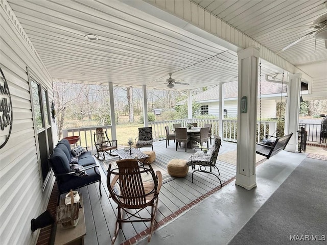 exterior space featuring ceiling fan and outdoor dining area