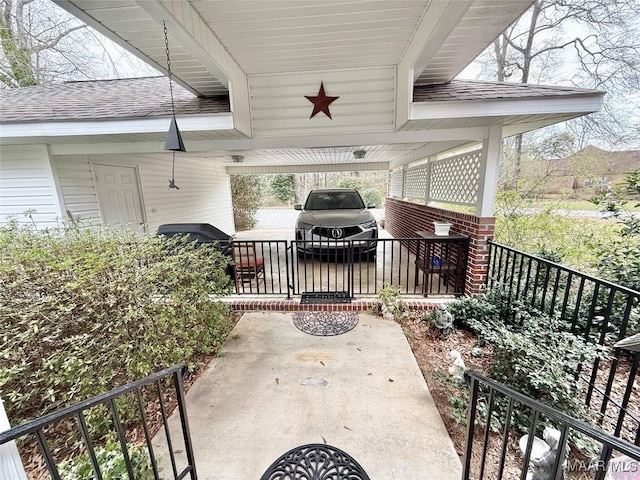 view of patio with an attached carport