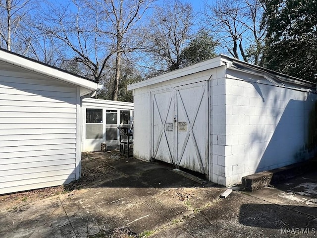 view of outbuilding featuring an outdoor structure