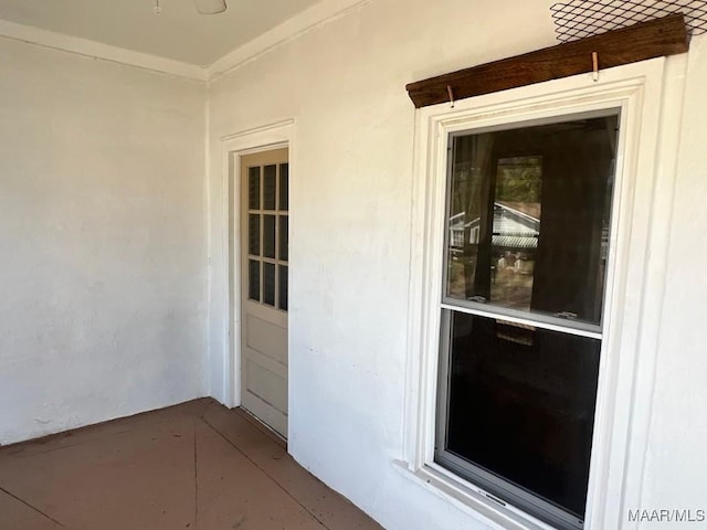 doorway to property with stucco siding