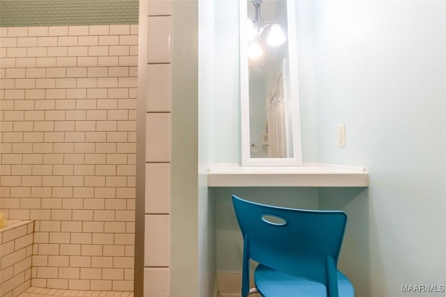 bathroom featuring a stall shower