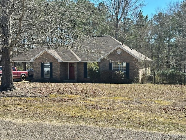 ranch-style house with brick siding