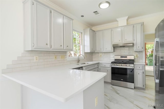 kitchen with under cabinet range hood, a sink, visible vents, marble finish floor, and appliances with stainless steel finishes