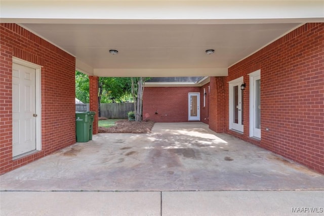 view of patio featuring fence