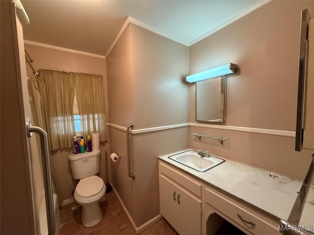 bathroom featuring toilet, vanity, baseboards, tile patterned floors, and crown molding