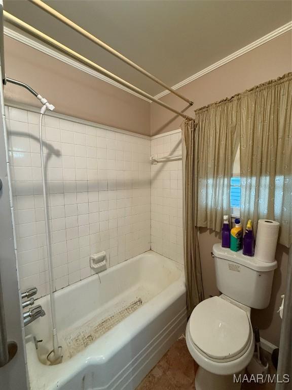 bathroom with toilet and shower / bathtub combination