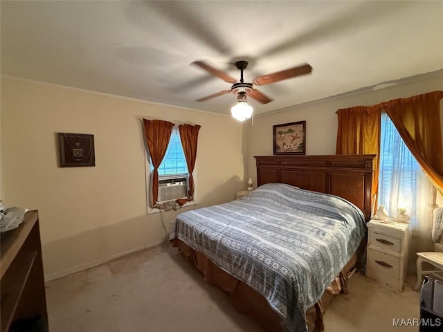 bedroom with cooling unit, light colored carpet, and crown molding